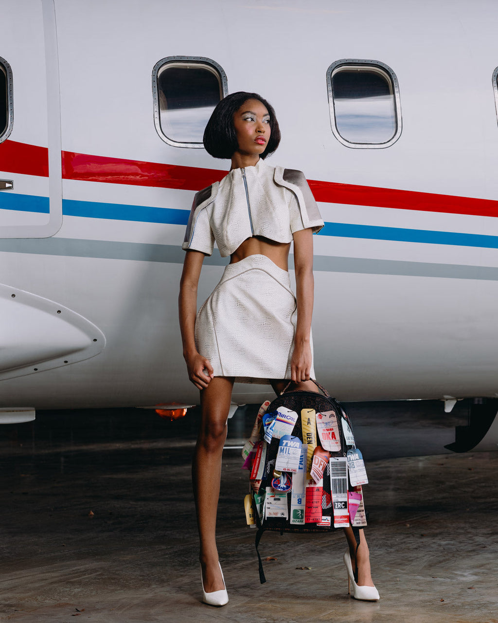AMERICAN AIRLINES 100 YRS - TAGS ON TAGS BACKPACK