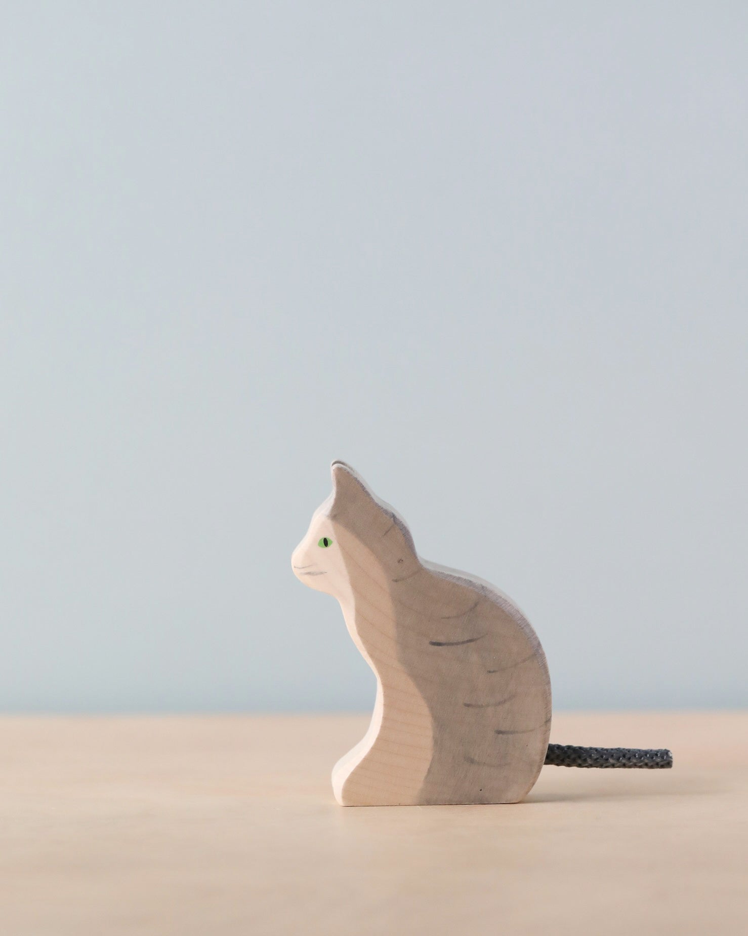 Holztiger Sitting Gray Cat