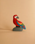 Handmade Wooden Parrot On A Rock