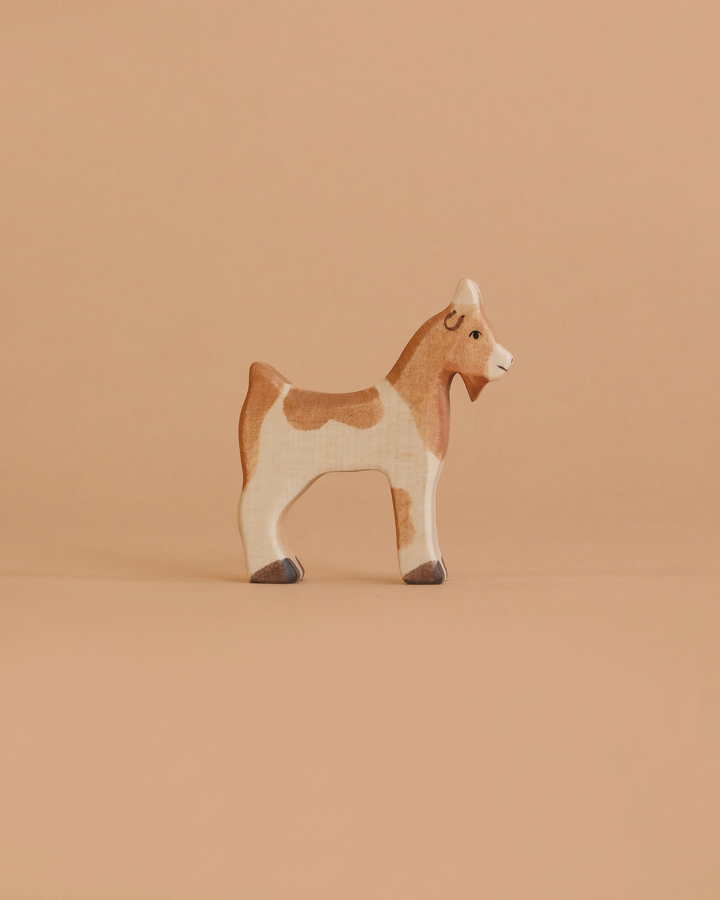Holztiger Goat
