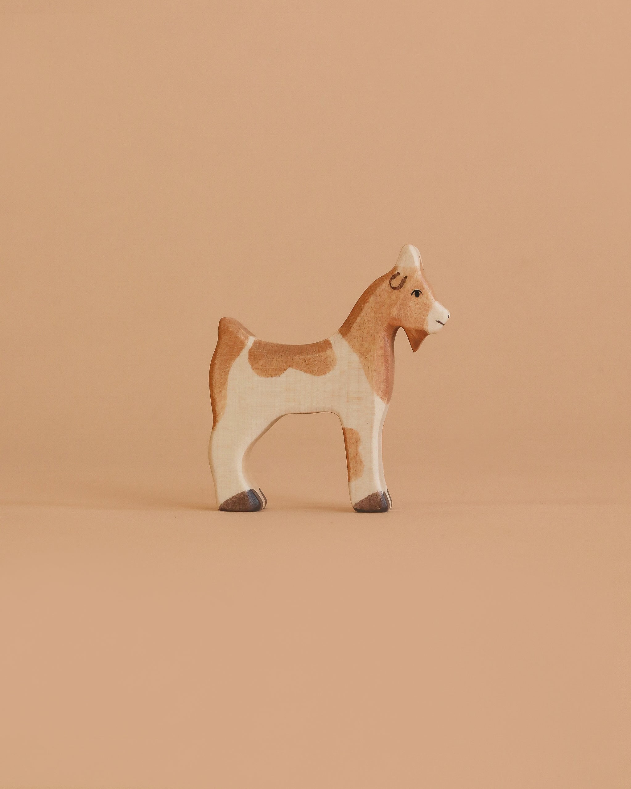 Holztiger Goat