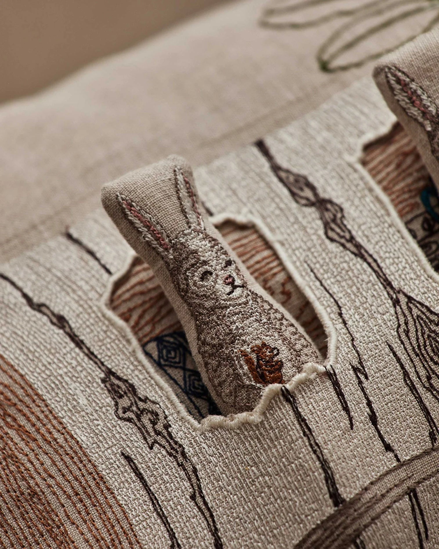 Coral & Tusk Aspen Log Bunnies Pocket Pillow