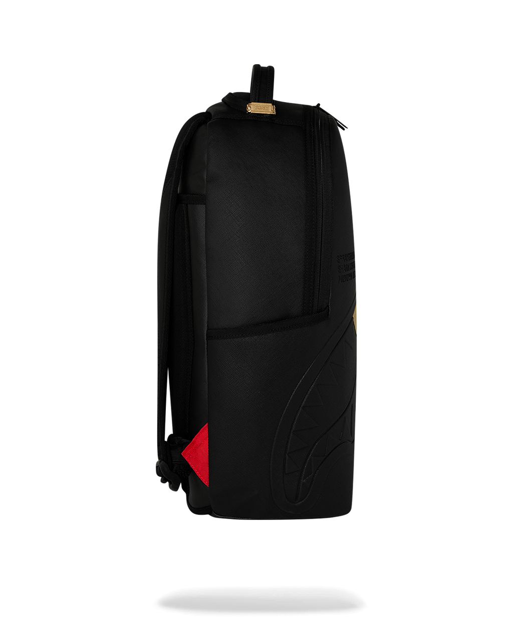 THE GOLDEN FANG SHARK BACKPACK