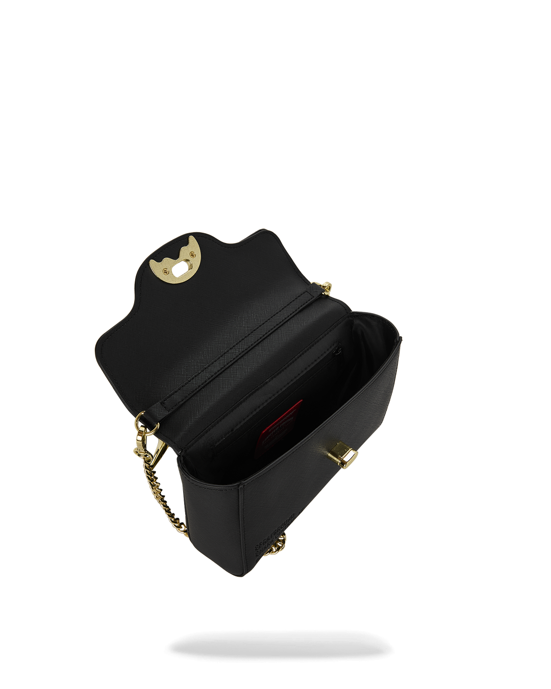 THE GOLDEN FANG SHARK HANDBAG