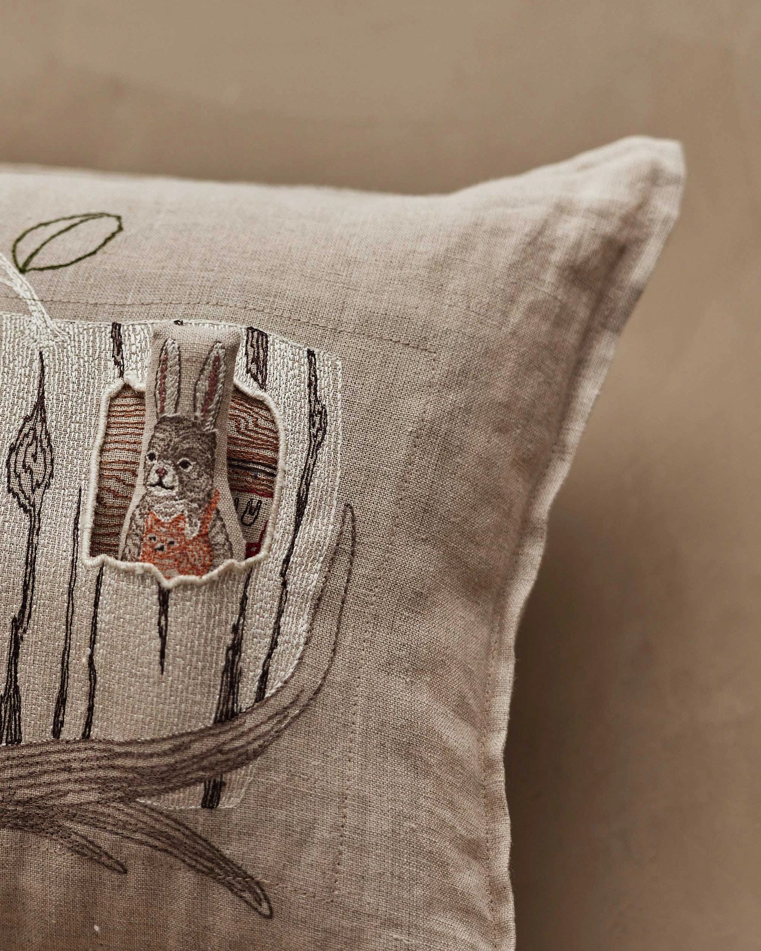 Coral & Tusk Aspen Log Bunnies Pocket Pillow
